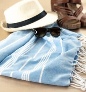 Beach vacation packing essentials flat lay