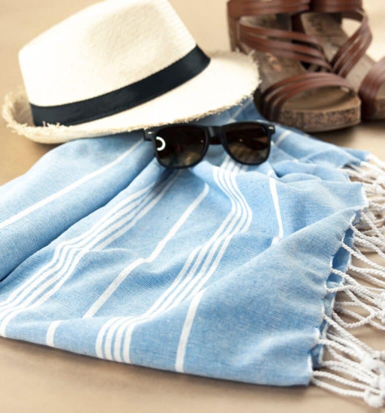 Beach vacation packing essentials flat lay