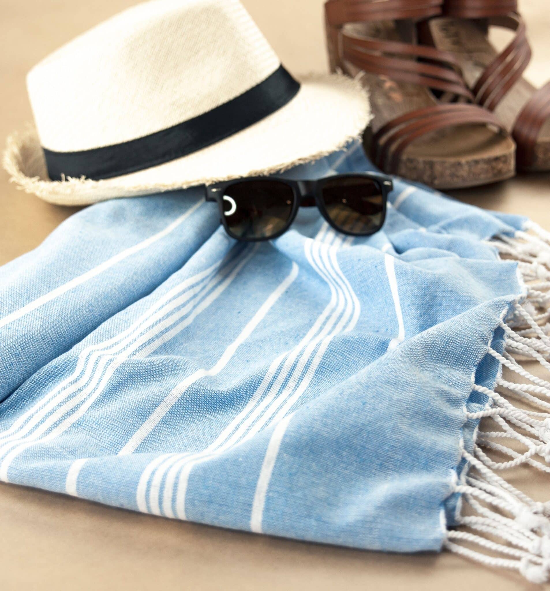 Beach vacation packing essentials flat lay