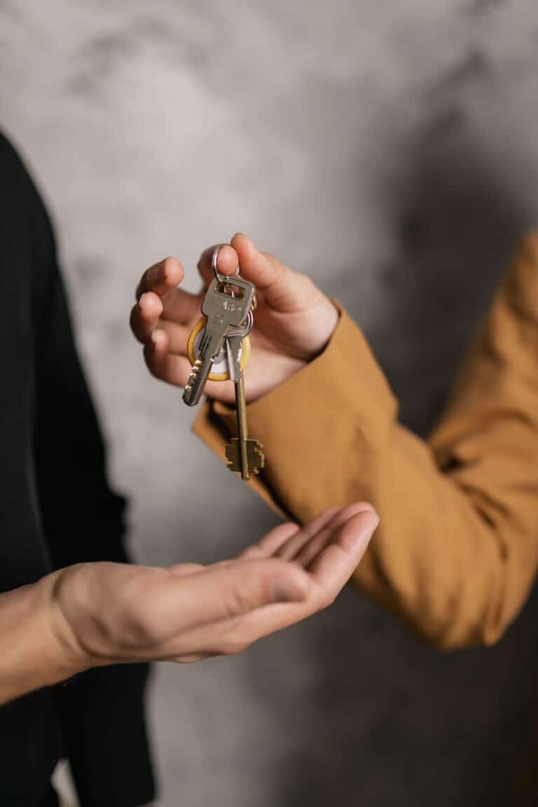 Host handing over keys to guest