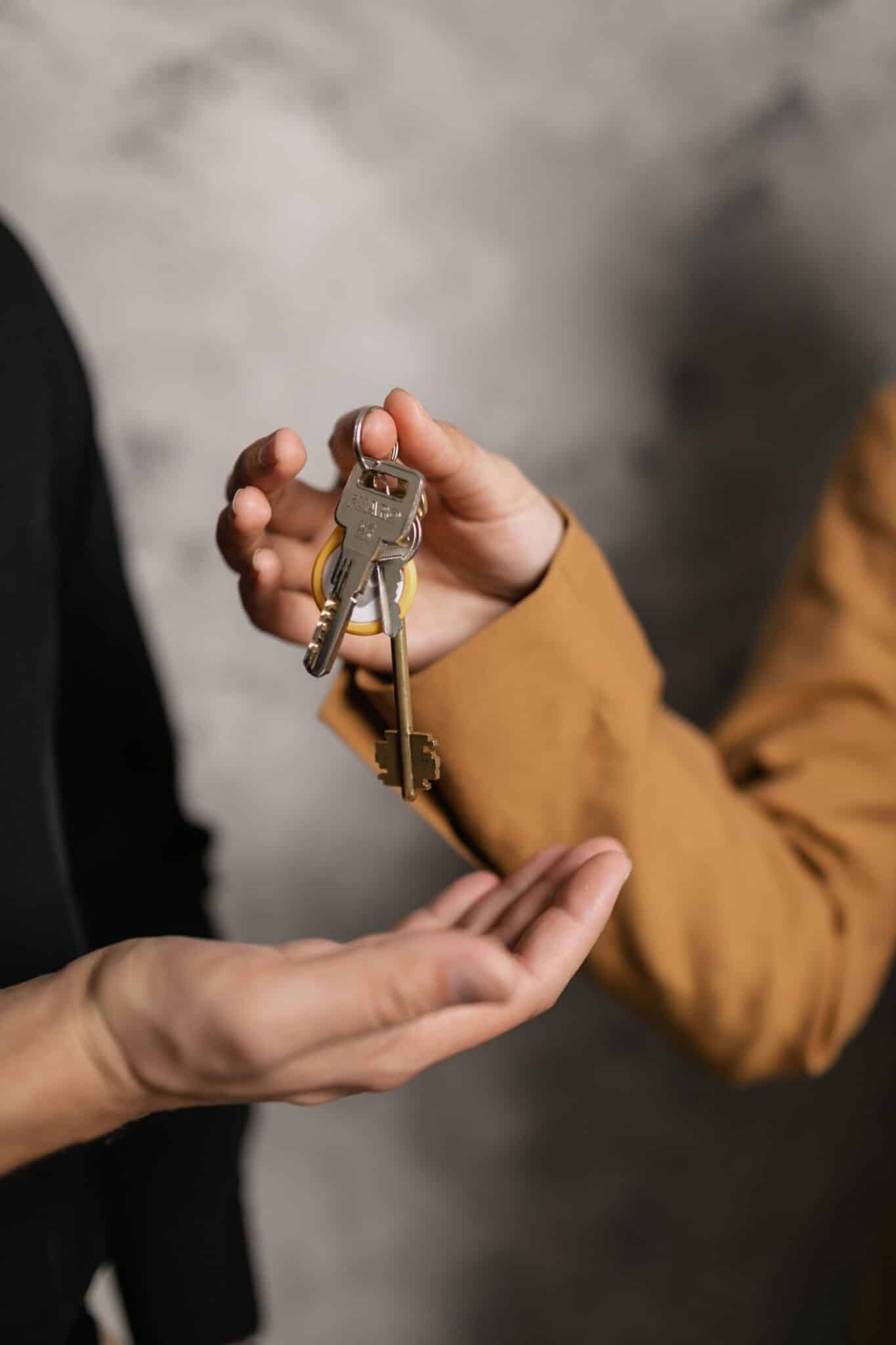 Host handing over keys to guest