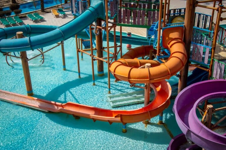 Colorful water park slides on a sunny day